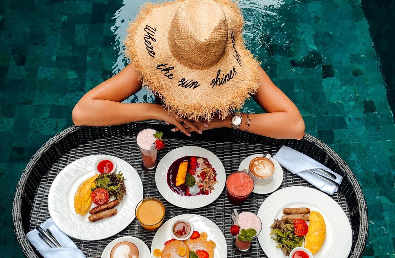 Goya Boutique Resort Ουμπούντ Εξωτερικό φωτογραφία A woman wearing a hat