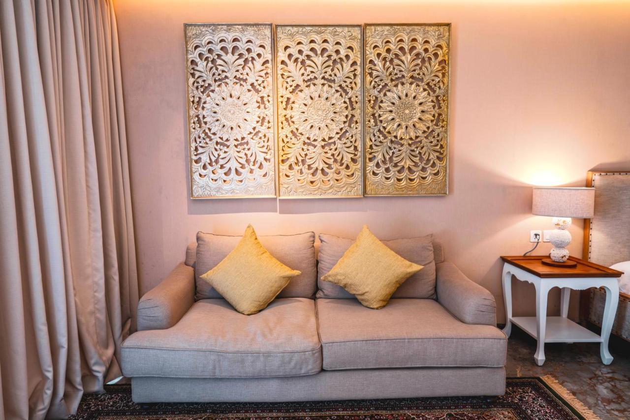 Goya Boutique Resort Ουμπούντ Εξωτερικό φωτογραφία A sofa